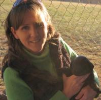 Chase with silver factored labrador Onyx as a puppy